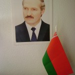 Photo of Belarus' President Lukashenko together with national flag