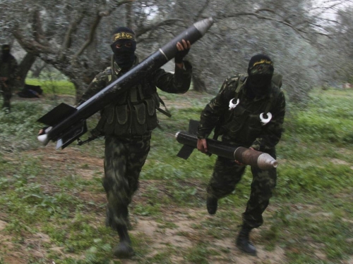 Jihadists carrying rockets. 